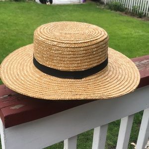 Flat top straw hat with black band